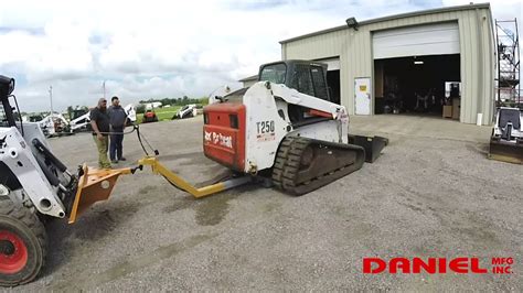 winching dead skid steer|moving a dead skid steer.